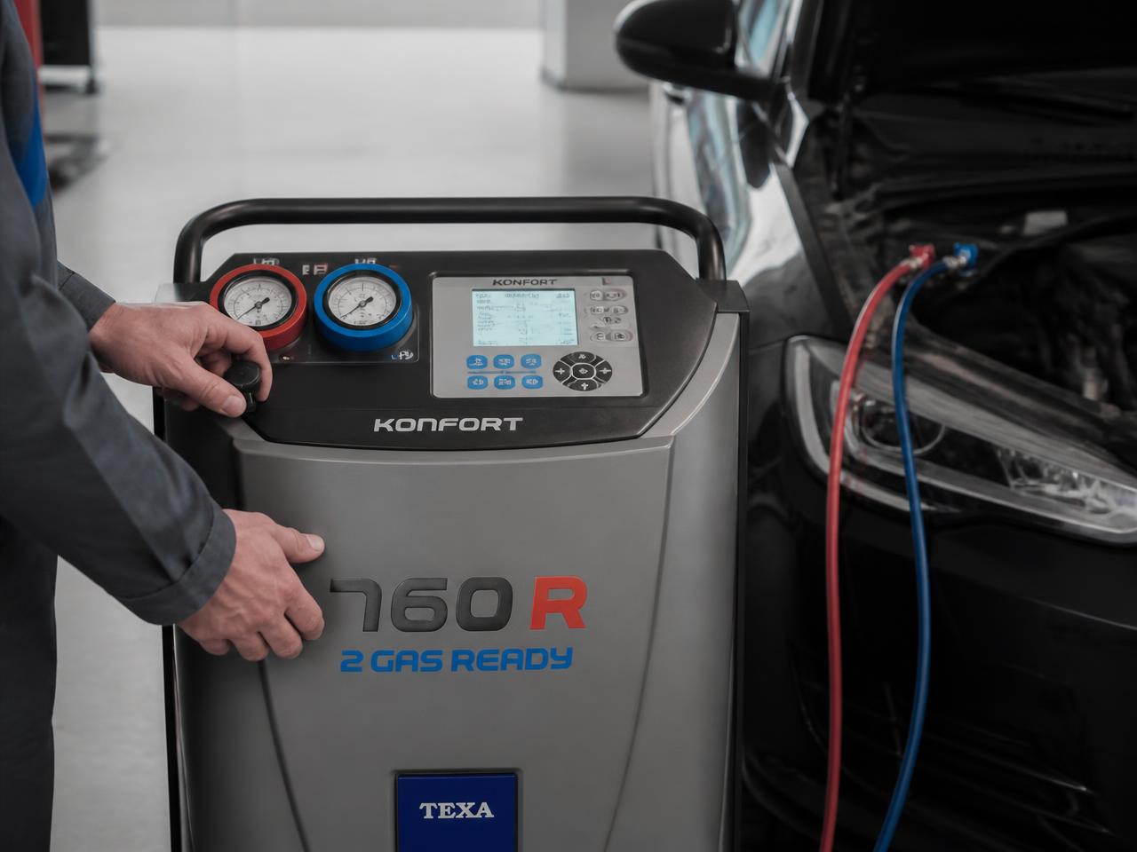 Air conditioning service machine connected to a car at Hisseys Garage